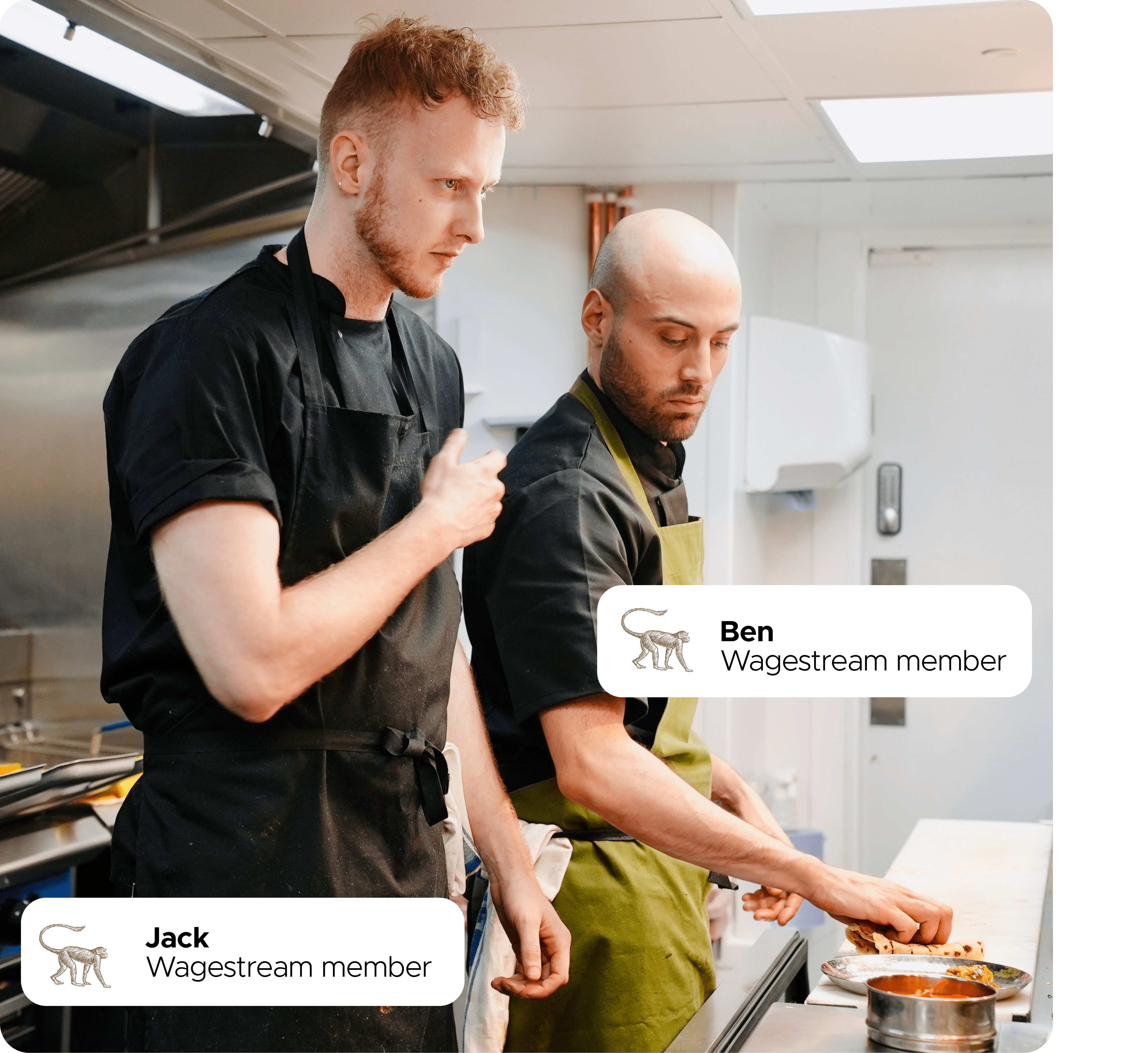 Two Wagestream members, Jack and Ben, collaborate in a restaurant kitchen.
