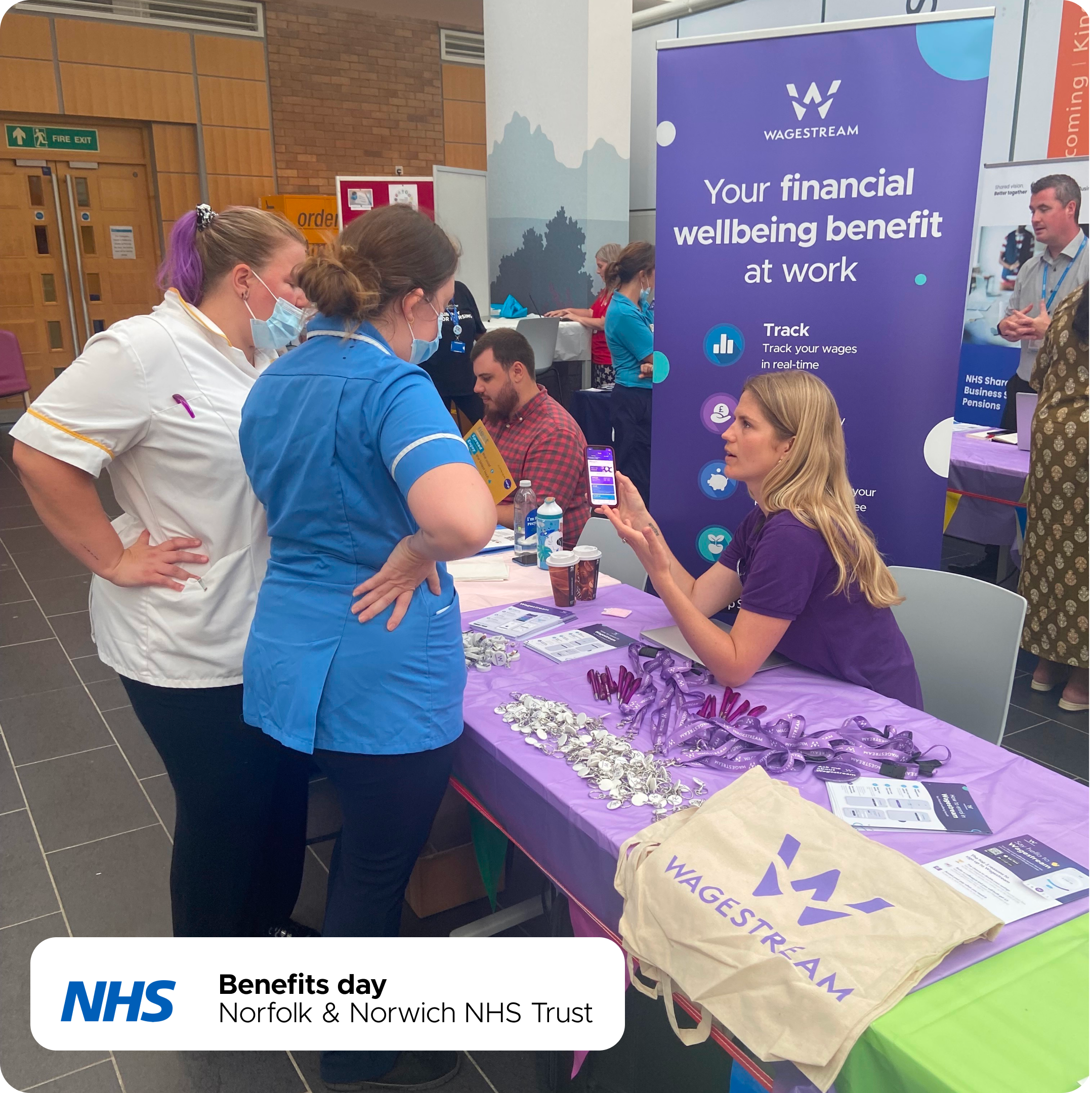 NHS staff at a benefits day learning about Wagestream's financial wellbeing platform.
